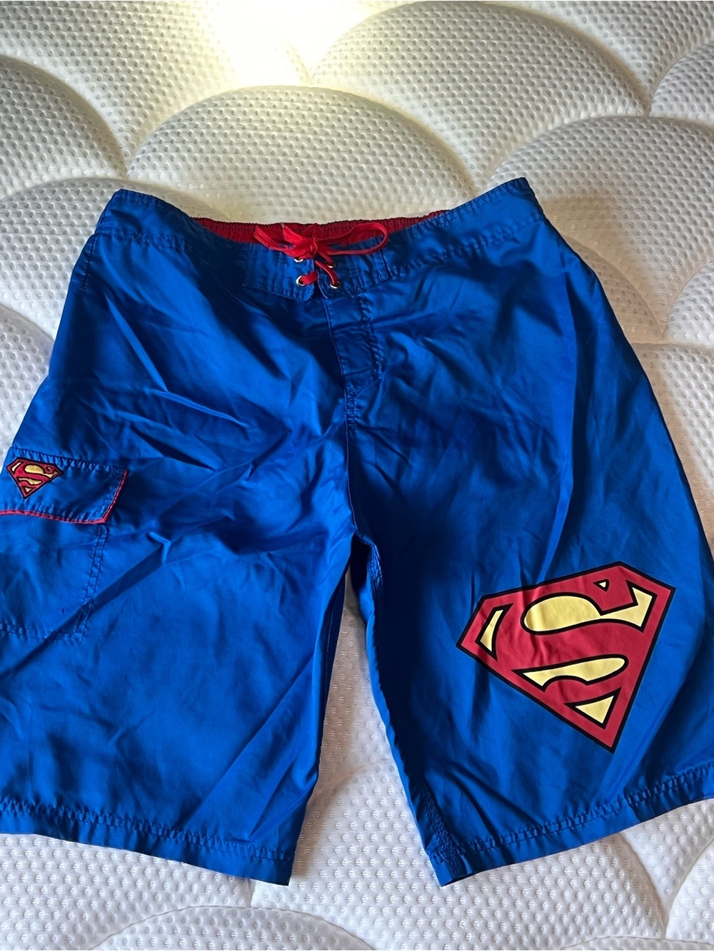 DC Comics Blue Swim Board Shorts with Red Drawstring and Yellow Superman Logo